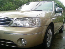 Bán xe Ford Laser1.8GhiA màu vàng cát, SX 2005, ĐK 2007, giá 325 triệu