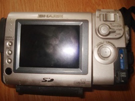 Bán máy quay phim dùng băng mini SHARP VL-NZ100 ,hàng Mỹ gởi về, giá 4tr