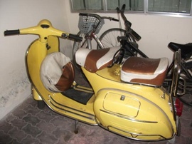 Cần bán vespa super sơn màu vàng, nhiều đồ zin gần 90%, biển TPHCM, máy bao đi xa