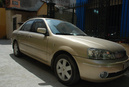 Tp. Hà Nội: Bán xe Ford Laser 1.8 số tay đời 2003 màu vàng cát sa mạc, biển HN đăng ký CL1050560