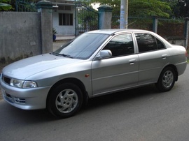 Cần bán mitsubishi lancer đời 2002