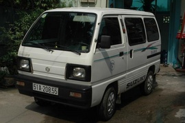 Bán xe suzuki 7 chỗ, đời 2001, màu trắng. 1 dàn lạnh.