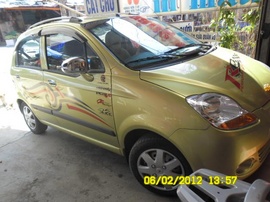 Bán 1 trong 2 con của vợ hoặc chồng. Chevrolet SPARK LT Trắng & Vàng 2009/ 29A