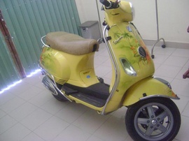 Bán Piaggio Vespa LX 125VN 2010 có khóa từ, màu vàng Zin 100%, mới 99%