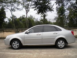 Cần bán Lacetti 30/ 12/ 2009, chất lượng 99%, màu ghi, sơn rin 100%,