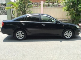 Bán xe Toyota Camry 3. 0V số tự động, màu đen, form 2004.